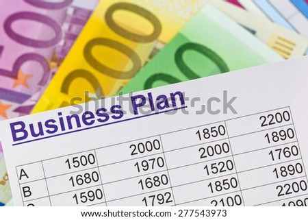 a business plan to start a business. ideas and strategies for business start-up. euro bills.