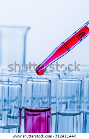 many test tubes in an attempt at a research laboratory of a university. learning and research symbolic photo for.