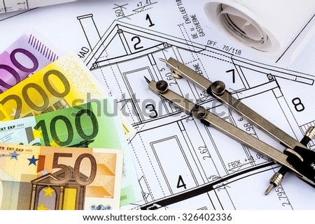 a blueprint of an architect with euro money. symbolic photo for financing and planning of a new house.