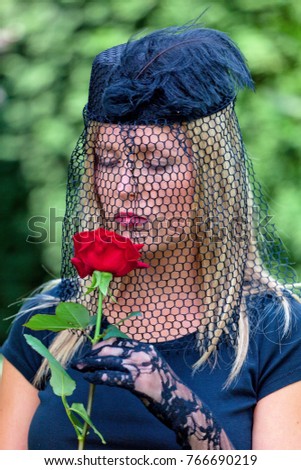 widow with veil and rose