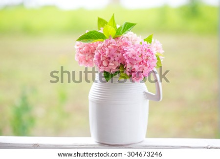 Hydrangea bouquet in white jug