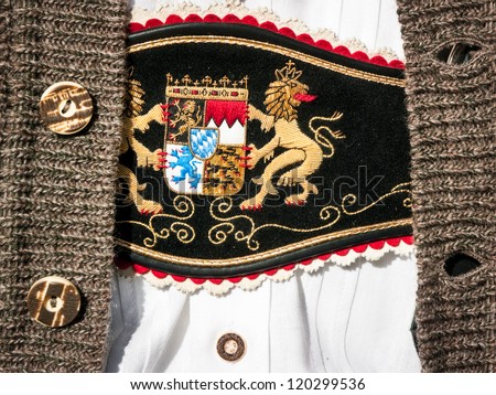 part of a typical bavarian traditional clothing (showing the coat of arms of bavaria)