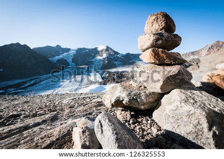 stack rocks at a creek in austria