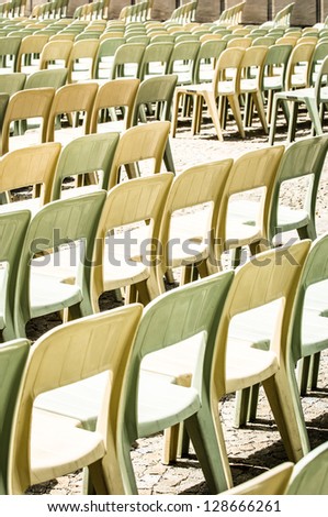 rows of chairs at a concert