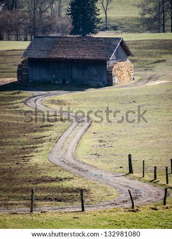 old stable in austria - dirt road