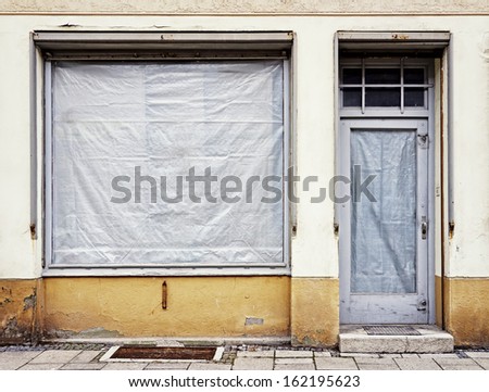 old closed store front - photo