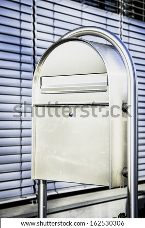 modern letter box in front of an office
