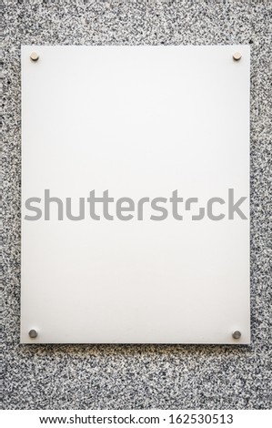 blank sign at a wall - nice background with space for text