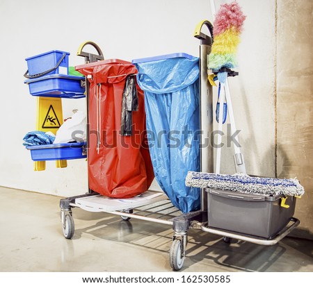 cleaning trolley (service cart) in front of wall