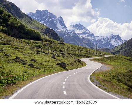 country road at the european alps