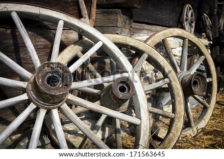 Old Wagon Wheels At A Farm