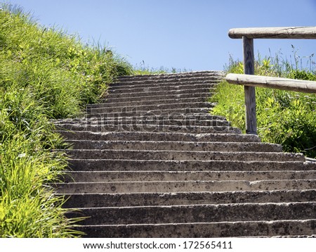 old steps at a meadow