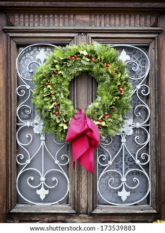 christmas wreath at a historic door