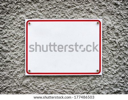 blank sign at a wall - background with space for text