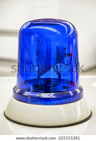 blue light at an old police car