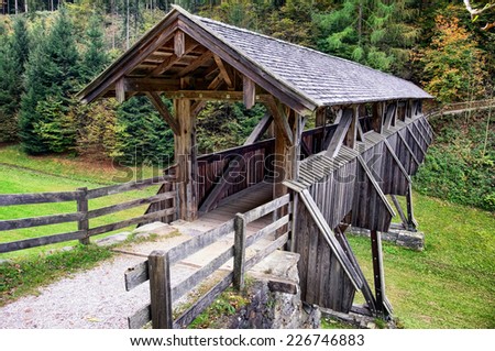 old covered bridge at a forest