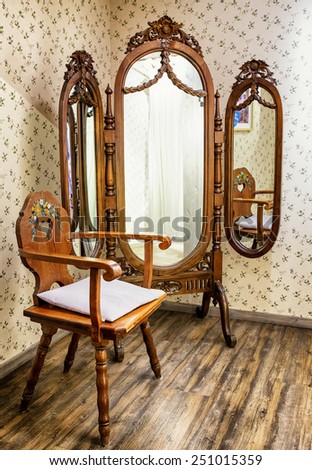 old chair and mirror - indoors