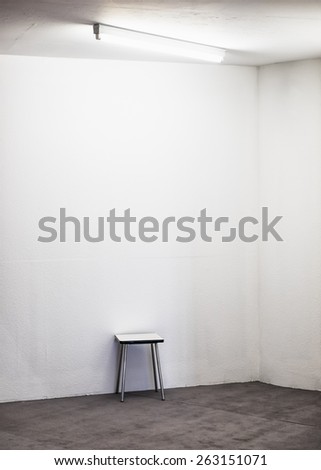 one chair at an empty room