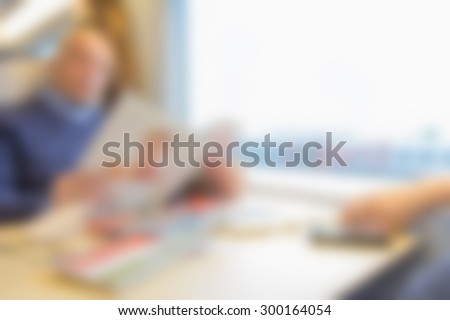 blur  traveler sitting and reading in high speed train