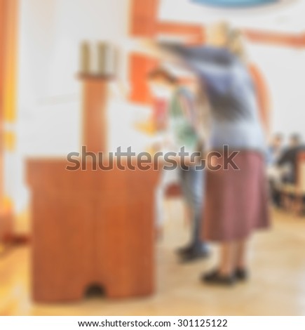 blur woman and food table in dining room