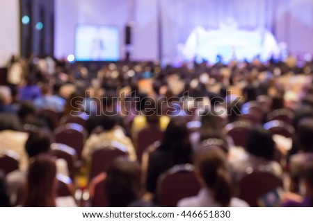 Blur  audience sitting in hall or auditorium  or classroom