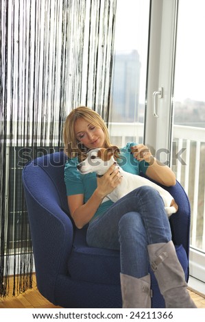 woman with her dog in her apartment
