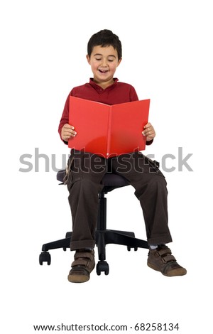 school boy reading a book