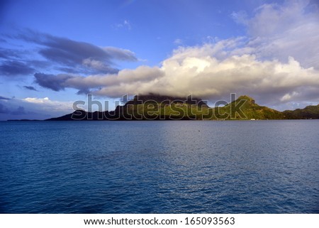 Bora Bora. View over beautiful blue lagoon to volcanic Mount Otemanu, Bora Bora Island, French Polynesia.