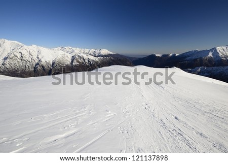Back country skiing in scenic high mountain landscape.