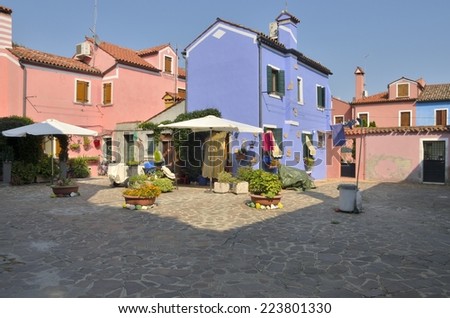 BURANO, ITALY - AUGUST 10: Colorful houses on August 10, 2014 in Burano, an island of Venice, Italy with colorful houses in Burano, an island of Venice, Italy