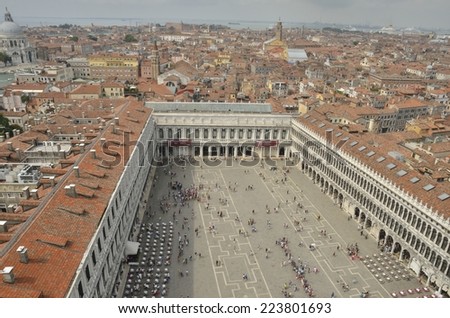 VENICE, ITALY - AUGUST 11: Lots of people in the Plaza of Saint Mark, seen from the tower of Saint Mark on August 11, 2014 in Venice, Italy.