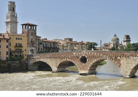VERONA, ITALY - AUGUST 6: The Stone Bridge on August 6, 2014 in Verona, Italy. It is a Roman arch bridge crossing the Adige River and was completed in 100 BC. It is the oldest bridge in Verona.