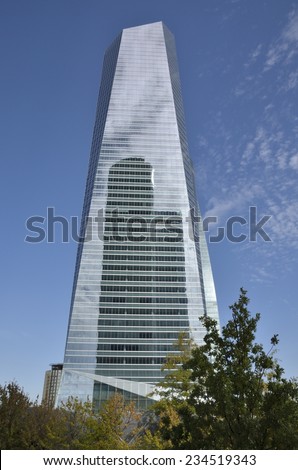 MADRID, SPAIN - OCTOBER, 18: Reflection of the PwC Tower into the Crystal tower Space on October 18, 2014 in the Four Towers Business Area in Madrid, Spain.