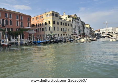 VENICE, ITALY - AUGUST 9: The Rialto Bridge, one of the four bridges spanning the Grand Canal  on August 9, 2014 in Venice, Italy. It is the oldest bridge across the canal.