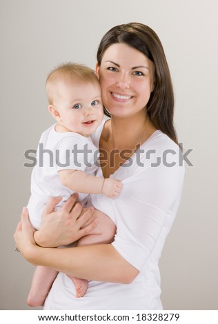 loving mother holding baby