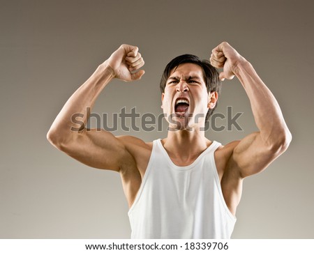 Excited and aggressive athlete cheering his success