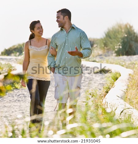 stock photo : Couple walking on beach