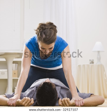 A Beautiful Addiction (Philip) - Page 2 Stock-photo-attractive-couple-wrestling-with-woman-on-top-of-the-man-square-composition-32927107