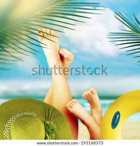 Feet of child and mom on the sky background. Vacation background.