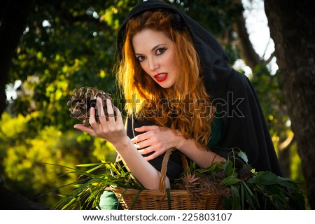 redhead woman in the forest