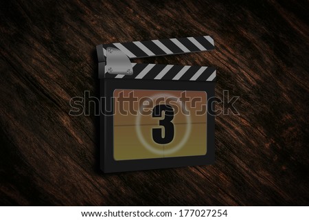 Vintage video media with movie clapper board on  old wood background