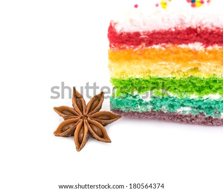 Star anise with rainbow cake  isolated on white background