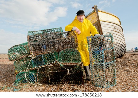 Fisherman At Work With Lobster Cages