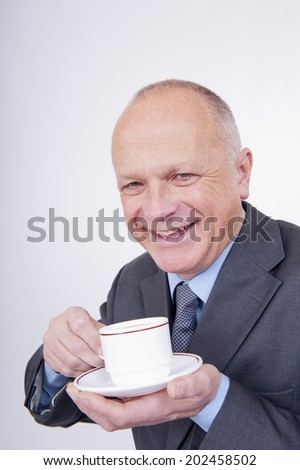 Tea Break For Happy Businessman - stock-photo-tea-break-for-happy-businessman-202458502