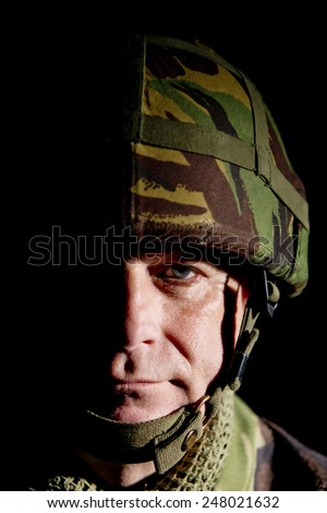 Soldier With Half Face In Shadow