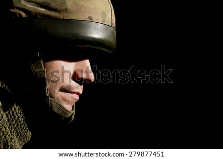 British Soldier With Face In Shadow