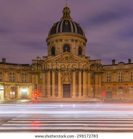 Paris, France. October 17, 2015: Institut de France in Paris. Night shot with car light strikes, shot as HDR