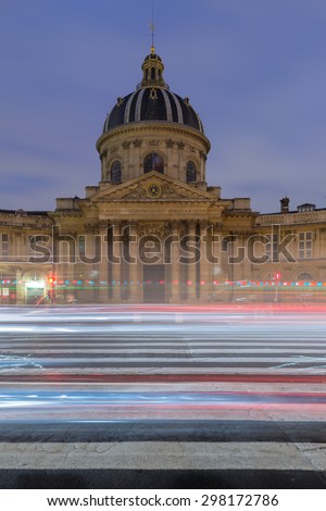 Paris, France. October 17, 2015: Institut de France in Paris. Night shot with car light strikes ,shot as HDR