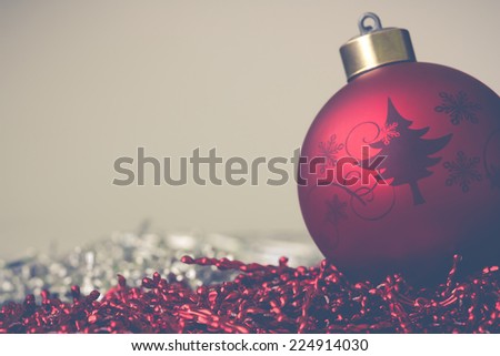 Christmas ball with a red and silver background