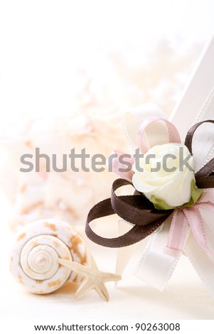 stock photo wedding decoration with romantic seashell on a purple white